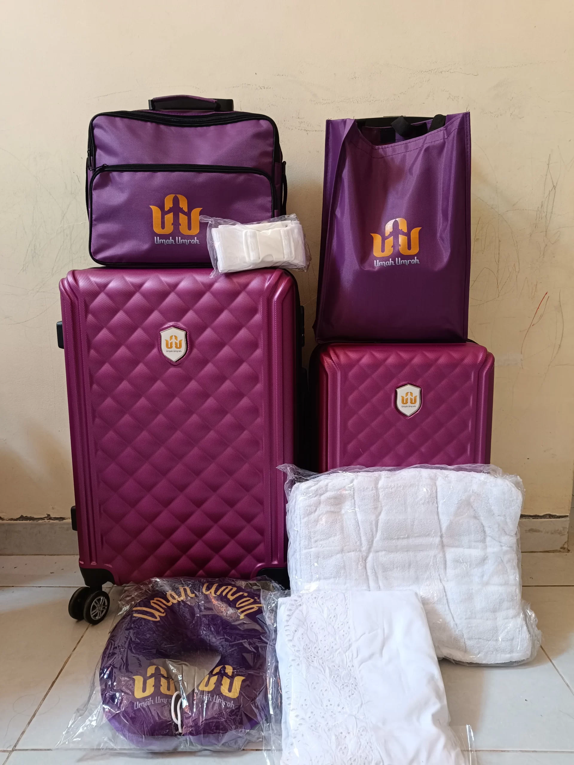Produksi koper umroh custom dengan logo biro travel eksklusif